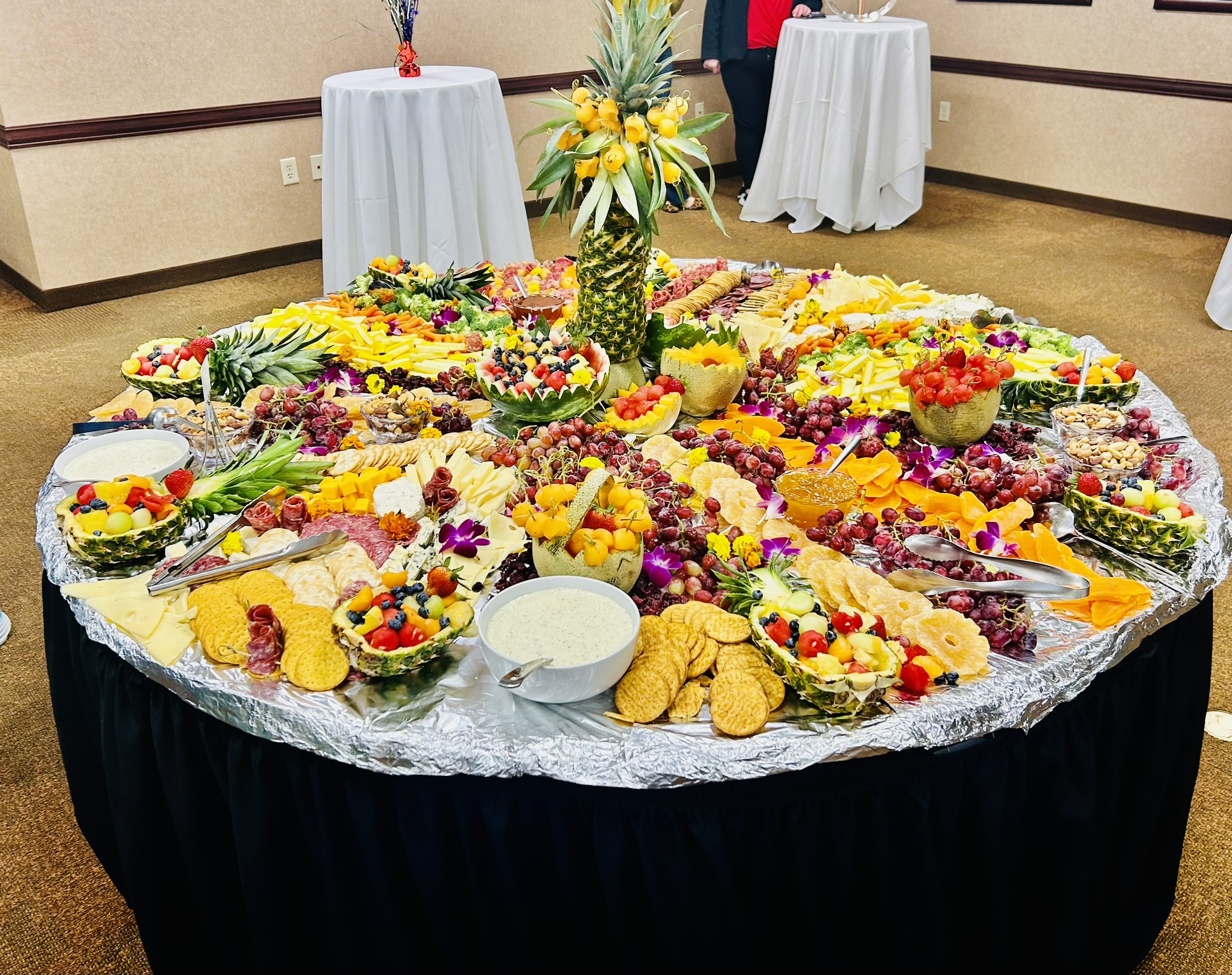 Chef Heather Fraser meticulously plating an appetizer for a high-end Atlanta event.
